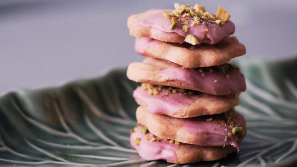 Cardamom shortbread cookies with ruby chocolate and pistachio